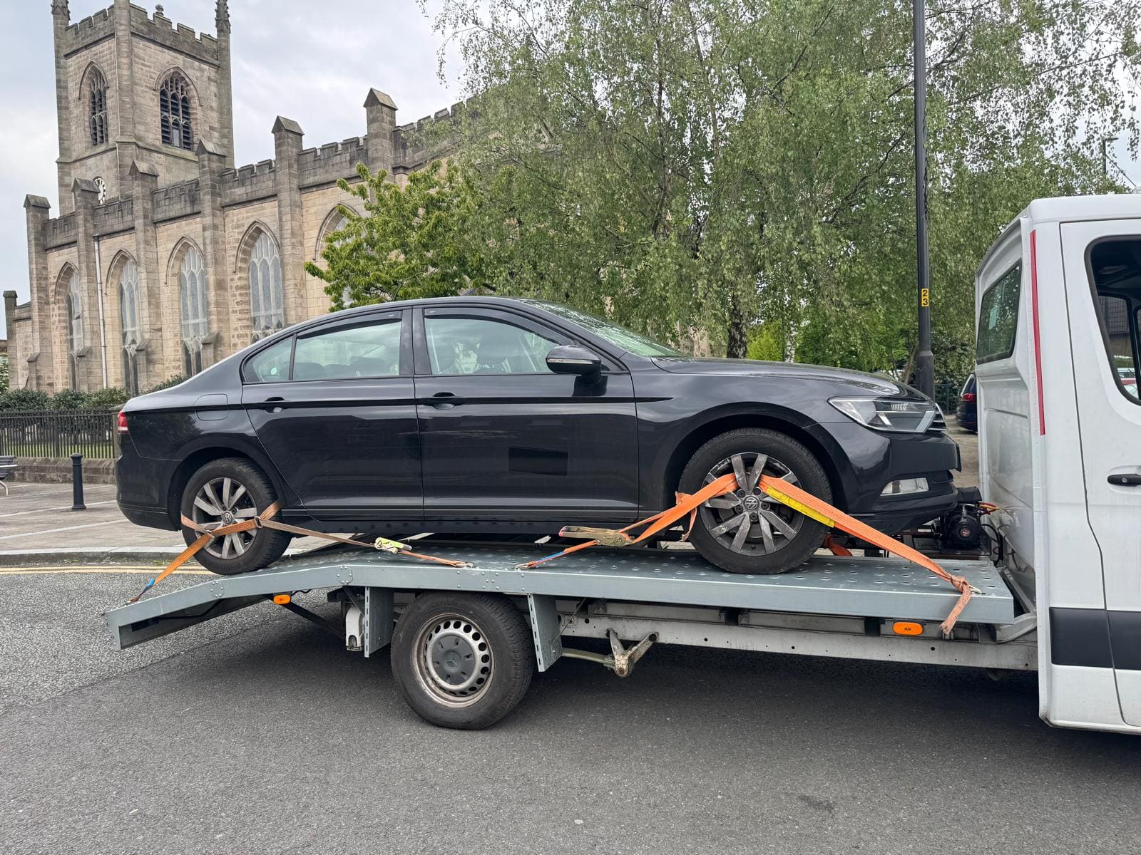 Recovery truck securing a car in South Yorkshire